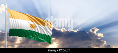 Niger wehende Flagge auf blauen Himmel. 3D-Darstellung Stockfoto