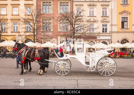 Reiten und Kutschfahrten, Hauptplatz, Krakau, Polen Stockfoto