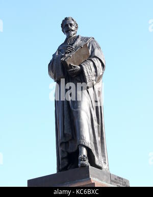 Statue des renommierten 17. Jahrhundert niederländischer Jurist und Philosoph Hugo de Groot (Grotius) auf dem zentralen Markt in seiner Heimat Delft, Niederlande. Stockfoto