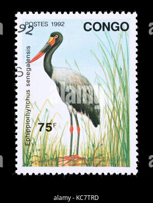 Briefmarke aus dem Kongo, der einen Sattel - Storch in Rechnung gestellt (Ephippiorhynchus senegalensis) Stockfoto