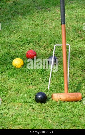 Croquet Mallet mit Kugeln Stockfoto