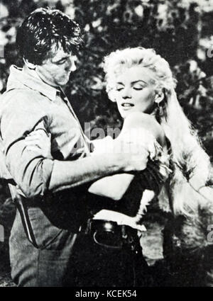 Foto von Marilyn Monroe (1926-1962) eine US-amerikanische Schauspielerin, Sängerin und Model, mit Robert Mitchum (1917-1997) ein US-amerikanischer Schauspieler, Regisseur, Autor, Dichter, Komponist und Sänger. Vom 20. Jahrhundert Stockfoto