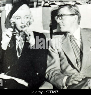 Foto während der Dreharbeiten zu "Wie zu Heiraten ein Millionär' mit Marilyn Monroe (1926-1962) und David Wayne (1914-1995). Vom 20. Jahrhundert Stockfoto