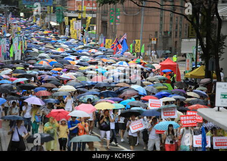 Rainly Tag in Hongkong Rallye, Juli ein Demonstrant Stockfoto