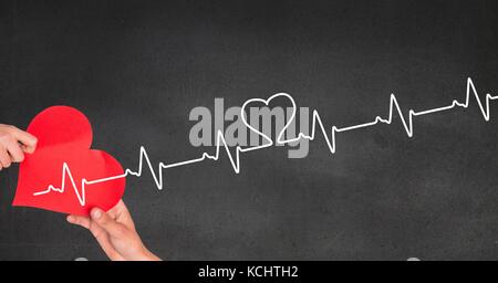 Digital composite der Herzschlag über Hände herzen Holding Stockfoto