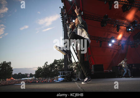 Die amerikanische Hip-Hop-Duo Macklemore & Ryan Lewis führt ein Live Konzert bei den Danish Music festival Roskilde Festival 2016. Hier Rapper und Sänger Macklemore ist live auf der Bühne gesehen. Dänemark, 30/06 2016. Stockfoto