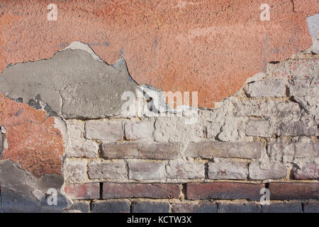 Alte zerstört Putz an die Wand. grunge Zement mit einem schäbigen Farbe Hintergrund. Stockfoto