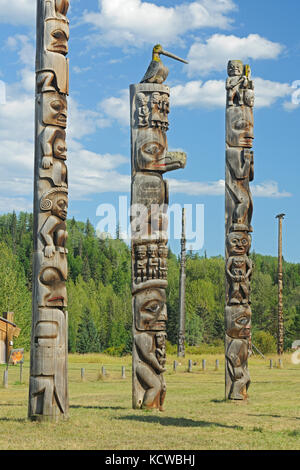 Kitwanga Totem Poles. Gitwangak oder Gitwangax. Gitanyow. Gitksan. Northwest Coast First Nations Nass Range of Mountains , Kitwanga, British Columbia, Kanada Stockfoto