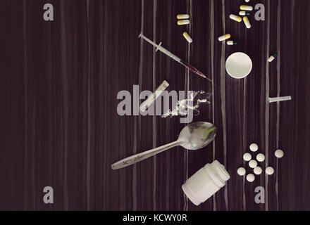 Krankheit Konzept. nein zu Drogen Konzept. Drogenabhängiger mit Drogen mit Hilfe von Handy oder Smartphone. Stockfoto