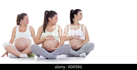 Gruppe von jungen schwangeren Frauen Yoga Stockfoto