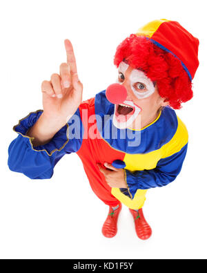 High Angle View Of Joker Anhebung Finger Over White Background Stockfoto