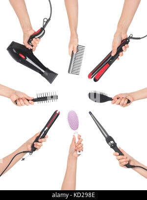 Hände halten Friseursalons Tools Stockfoto