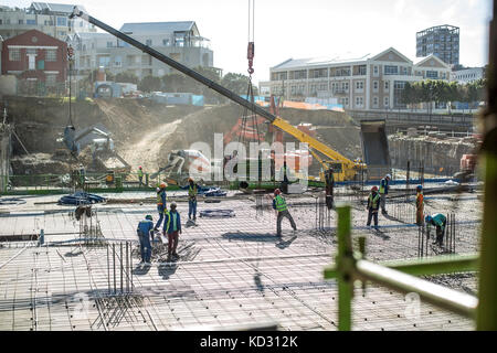 Bauarbeiter zur Gründung der Gebäude Stockfoto