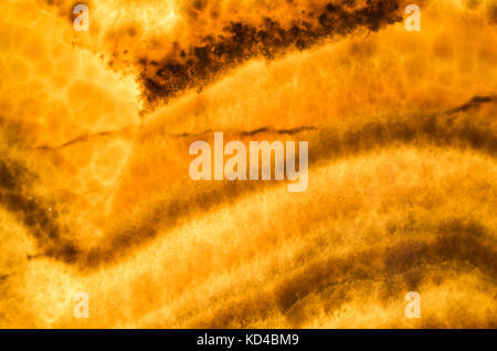 Honey Onyx, dekorative stone wall Panel, Nahaufnahme Hintergrund Textur Stockfoto