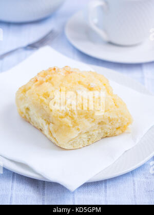 Traditionelle portugiesische Kokos Gebäck namens Pao de Deus (Brot Gottes). Stockfoto