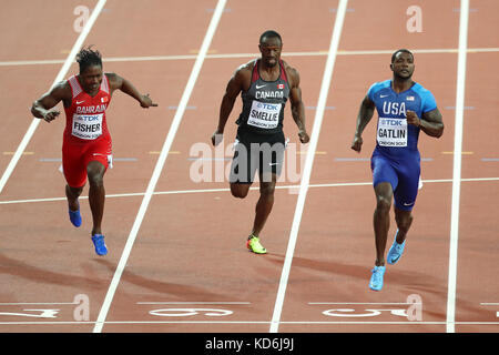 Justin Gatlin (Vereinigte Staaten von Amerika), Gavin Smellie (Kanada), Andrew Fisher (Bahrain) Überqueren der Ziellinie in der Männer 100 m Wärme 5 am 2017, Leichtathletik-WM, Queen Elizabeth Olympic Park, Stratford, London, UK. Stockfoto