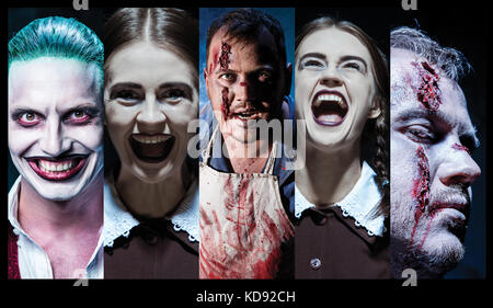 Die Scary clown Holding ein Messer auf dack. halloween Konzept Stockfoto