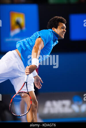 Jo-wilifried Tsonga konfrontiert. r Federer (SUI) der vierten Runde der Australian Open 2014 Männer singles. Als Grudge Match zwischen den Rivalen in Rechnung gestellt, federe Stockfoto