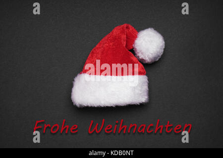 Frohe Weihnachten bedeutet frohe Weihnachten in deutscher Sprache Stockfoto