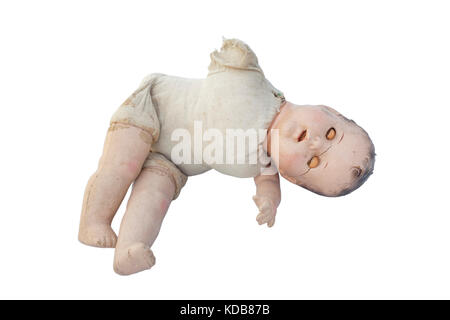 Beängstigend spooky Vintage Doll Baby. Isoliert. Vertikale. Stockfoto