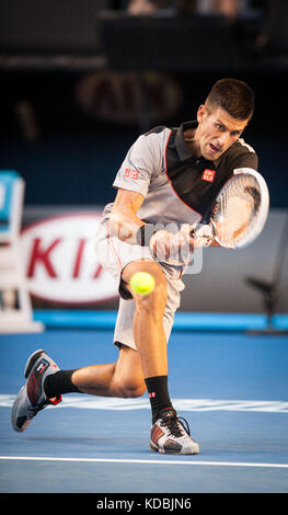 Novak Djokovic (SRB) ging gegen unseeded Lucas lacko (Svk) in einem Spiel der 2014 Australian Open in Melbourne Djokovic besiegt Lacko 6-3 Stockfoto