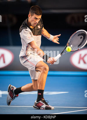 Novak Djokovic (SRB) ging gegen unseeded Lucas lacko (Svk) in einem Spiel der 2014 Australian Open in Melbourne Djokovic besiegt Lacko 6-3 Stockfoto