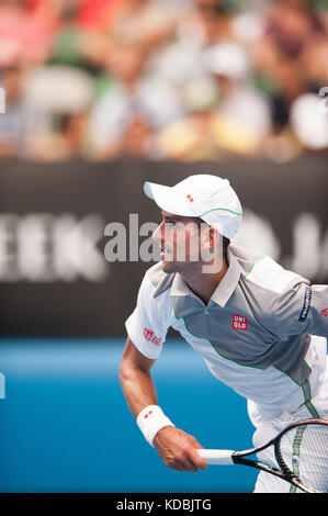 Verteidigung der Australian Open Champion Novak Djokovic (SRB) fand am l. Mayer (Arg) am dritten Tag, zweite Runde spielen. djokovic beat Mayer 6-0, 6-4, 6-4 bei m Stockfoto