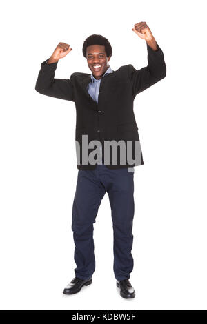 Porträt von glücklich aufgeregt Jungunternehmer Over White Background Stockfoto