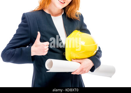 Frau Boss mit gelben Helm und Blueprints, auf Händen konzentrieren Stockfoto