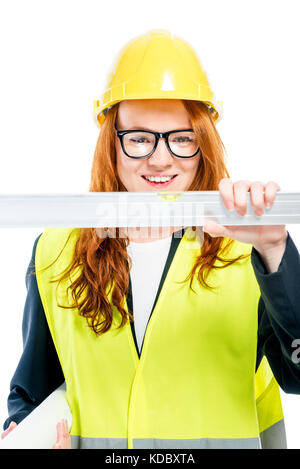Porträt eines Ingenieurs Frau mit einem Lineal auf weißem Hintergrund Stockfoto