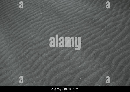 Windgepeitschte Muster im Sand am Ninety Mile Beach in Neuseeland Stockfoto