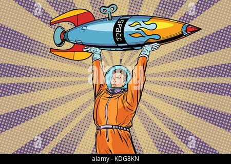 Astronaut Holding eine Weltraumrakete. pop art retro Vektor Illustrator Stock Vektor