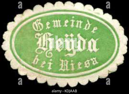 Ein Bild einer Siegelmarke aus der Gemeinde Heyda bei Riesa, Deutschland, das als amtliches oder historisches Zeichen in Verbindung mit der lokalen Verwaltung oder den Verwaltungsfunktionen des Gebiets dienen kann. Stockfoto
