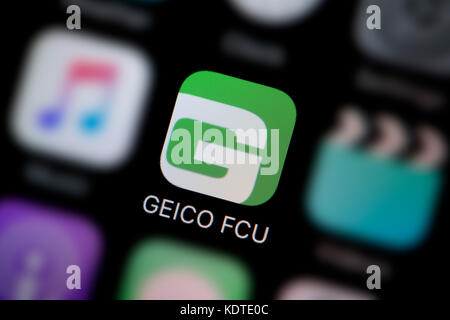 Eine Nahaufnahme der Logo für die geico FCU App Symbol, wie auf dem Bildschirm eines Smartphones (nur redaktionelle Nutzung) Stockfoto