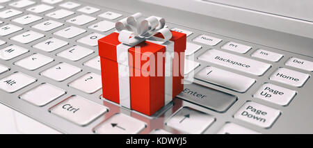 Geschenke kaufen online. Tastatur und roter Geschenkbox closeup. e-commerce an Feiertagen Konzept. 3D-Darstellung Stockfoto