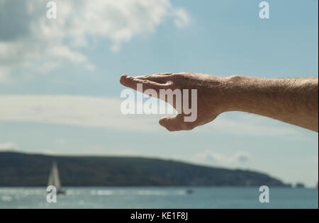 Der Mensch arm, Orte von Interesse, Gestikuliert - Foto Stockfoto