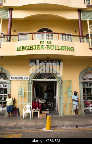 Die Seychellen, Mahe, Victoria, Market Street, Meghjee Kalyanji Gebäude, Indische besitz Allgemein Händler Shop Stockfoto