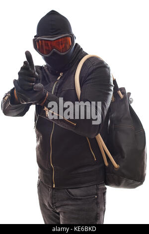 Gefährlicher Einbrecher in Schwarz gekleidet mit einer Maske auf dem Kopf - isoliert Hintergrund Stockfoto