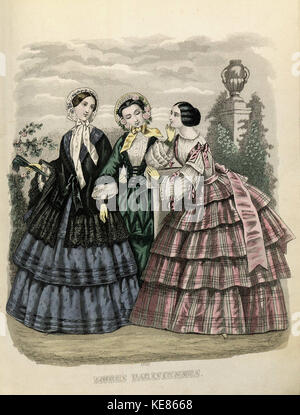 Diese Illustration aus dem Stockholmer Mode Journal von 1854 bietet eine visuelle Darstellung der Modetrends der Mitte des 19. Jahrhunderts in Schweden und gibt Einblicke in die kulturellen Vorlieben dieser Zeit. Stockfoto