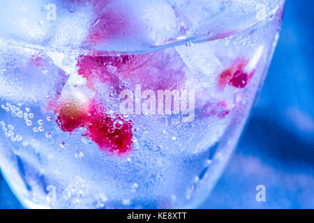 Granatapfel Samen in Ice Cold drink Stockfoto