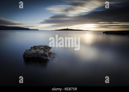 Lange Exposition bei Sonnenuntergang, Doolin Pier, Crab Island, Irland Stockfoto