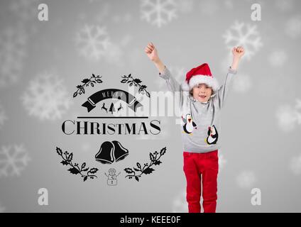 Digital composite der Junge gegen den grauen Hintergrund mit Weihnachtsmütze feiern und frohe Weihnachten text Stockfoto