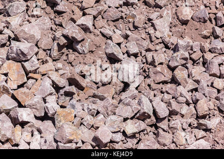 Industrielle Erdarbeiten Sprengarbeiten Felsen closeup Texturen Hintergrund overhead Foto ausbreiten. Stockfoto