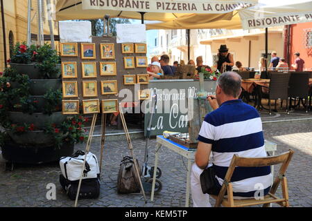 Künstler Malerei in Malcesine, am Gardasee, in der Region Lombardei, im Norden von Italien Stockfoto