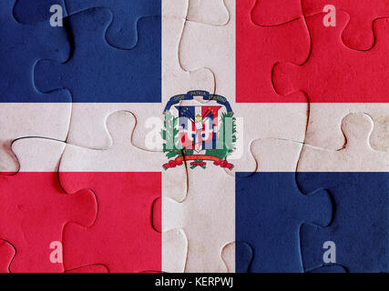 Abbildung einer Flagge von Dominikanische Republik über einige Puzzleteile. Sein ein jpg-bild. Stockfoto