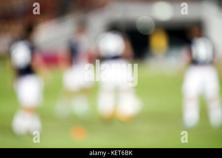 Blurry Fussball und Football Player Training für Hintergrund Stockfoto