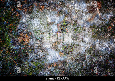 Strukturierte alte Granitwand: Ein natürlicher abstrakter Hintergrund. Granitstein-Textur, Nahbild, Tapete und Textur für das Rendern geeignet Stockfoto