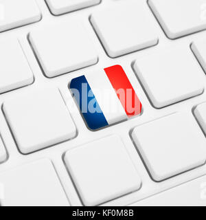 Französische Sprache oder Frankreich web Konzept. nationalflagge Schaltfläche oder Taste auf weiße Tastatur Stockfoto