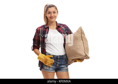 Frau Bauer Holding eine sackleinen Sack auf weißem Hintergrund Stockfoto