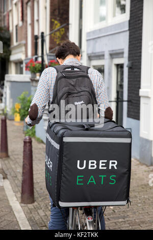 Uber isst, Fahrradfahrer. Stockfoto